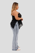 Blusa plus de un solo hombro negro