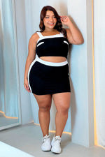 Set falda corta y top en tela tejida negro