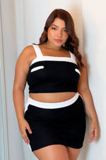 Set falda corta y top en tela tejida negro