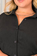 Set de manga corta y pantalón de corte recto negro