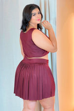 Set deportivo falda plisada vino