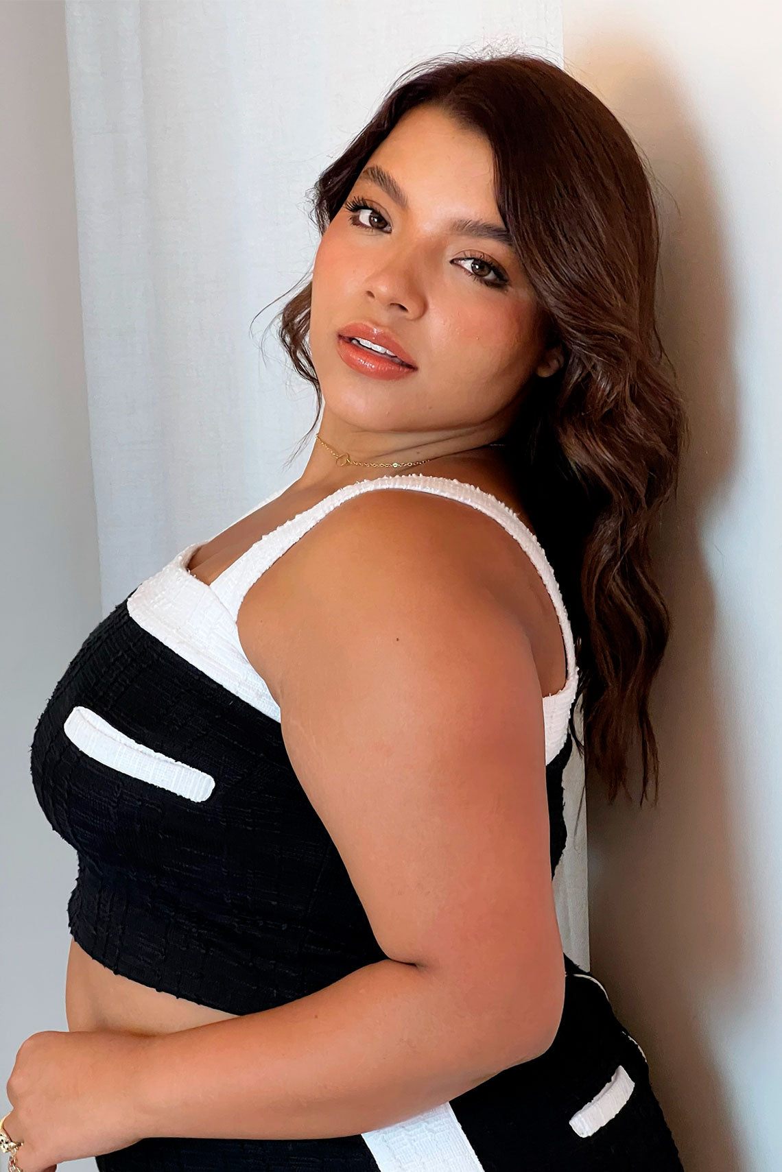 Set falda corta y top en tela tejida negro