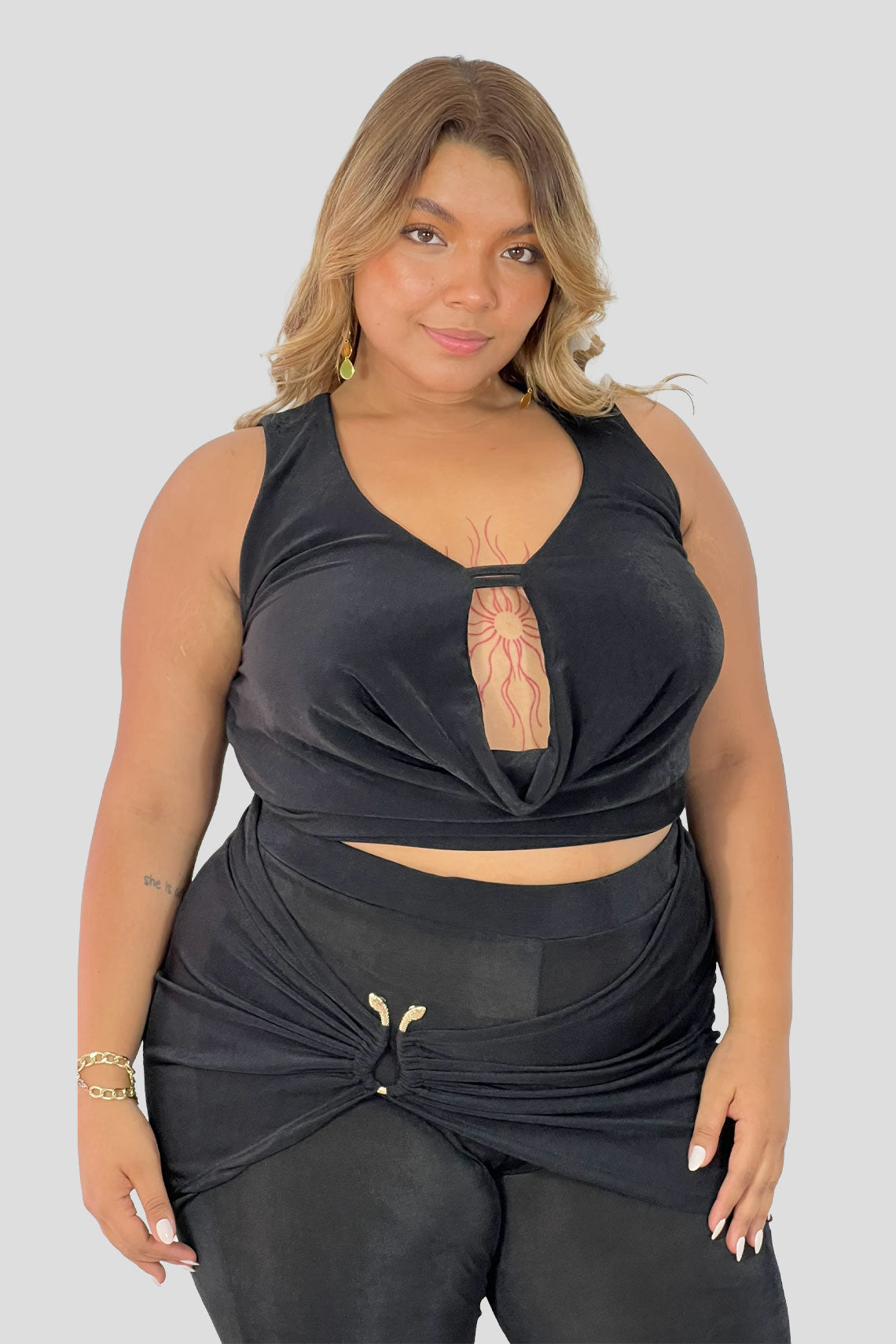 Set drapeado, pantalon y top Negro